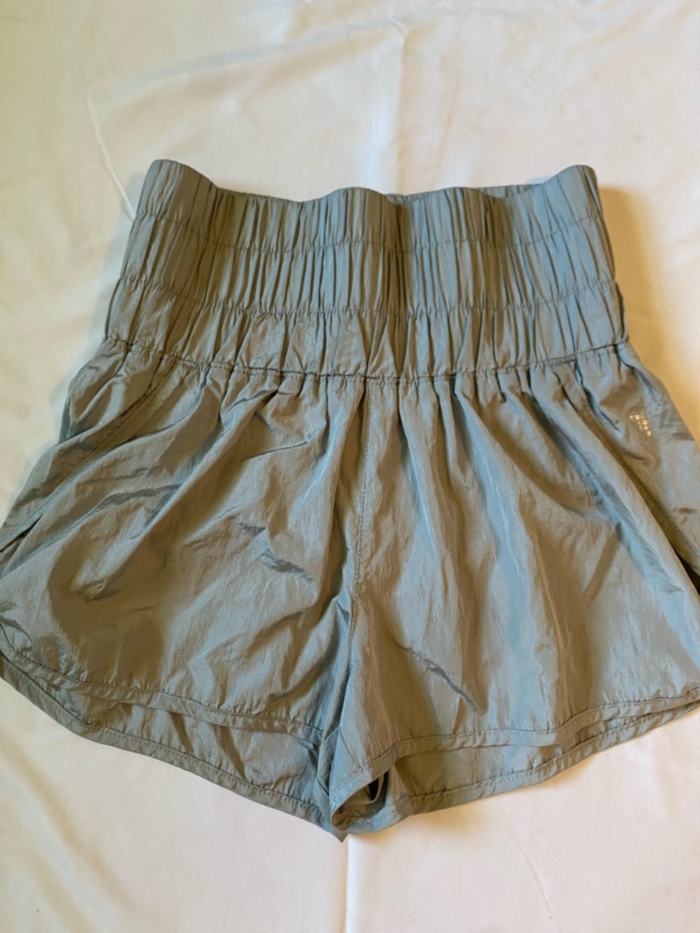 FP Movement by Free People Pale Blue Smocked High-Waist Shorts